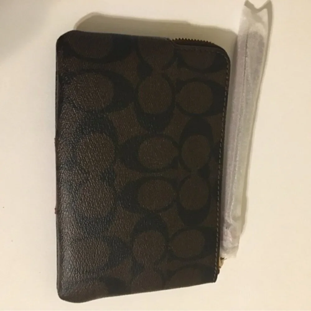 Coach signature coated canvas wristlet